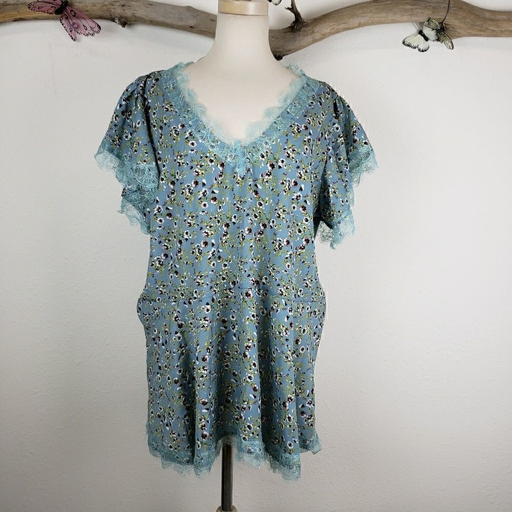 Suzanne Betro floral peplum blouse raw lace trim